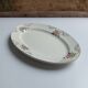 Oval plate Sarreguemines cream with pink gilding, antique.