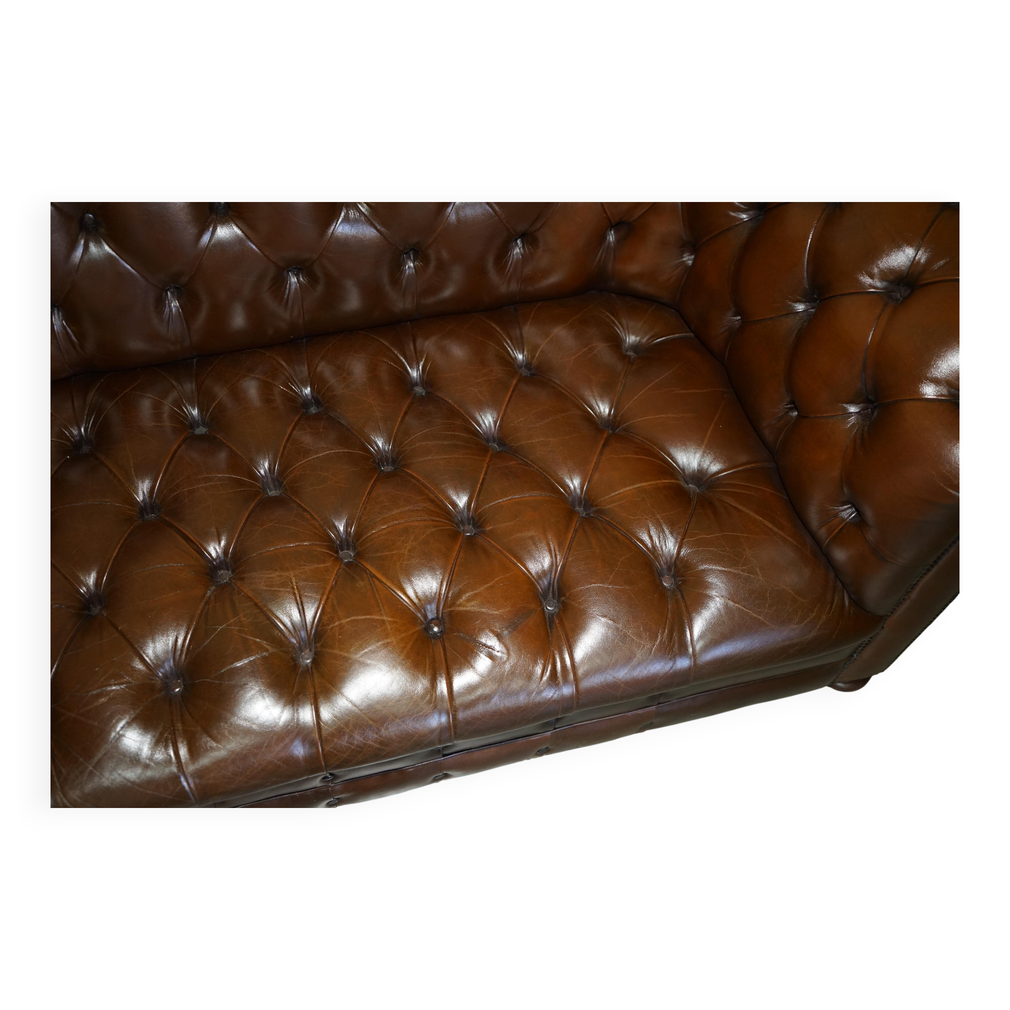 Restored Chesterfield leather sofa in vintage Art Deco style
