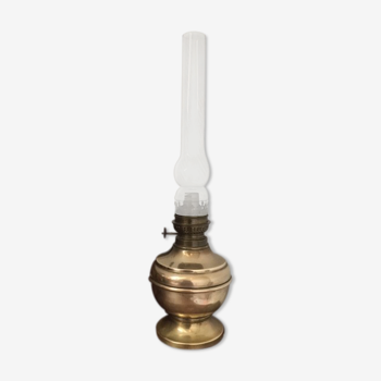 Old-fashioned brass standing oil lamp