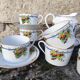 10 tea cups and creamer in Limoges porcelain