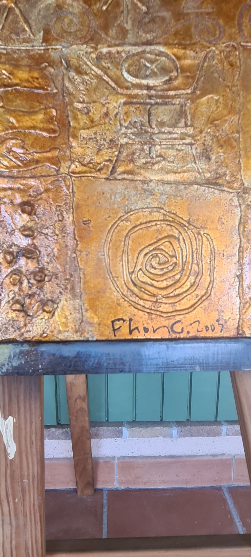 Lacquered table on wood