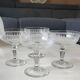 Lot of 4 x Champagne Coupes in Baccarat crystal. Engraved decoration with Greek friezes.