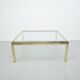 Hollywood Regency two-tone coffee table with glass top,  1970s