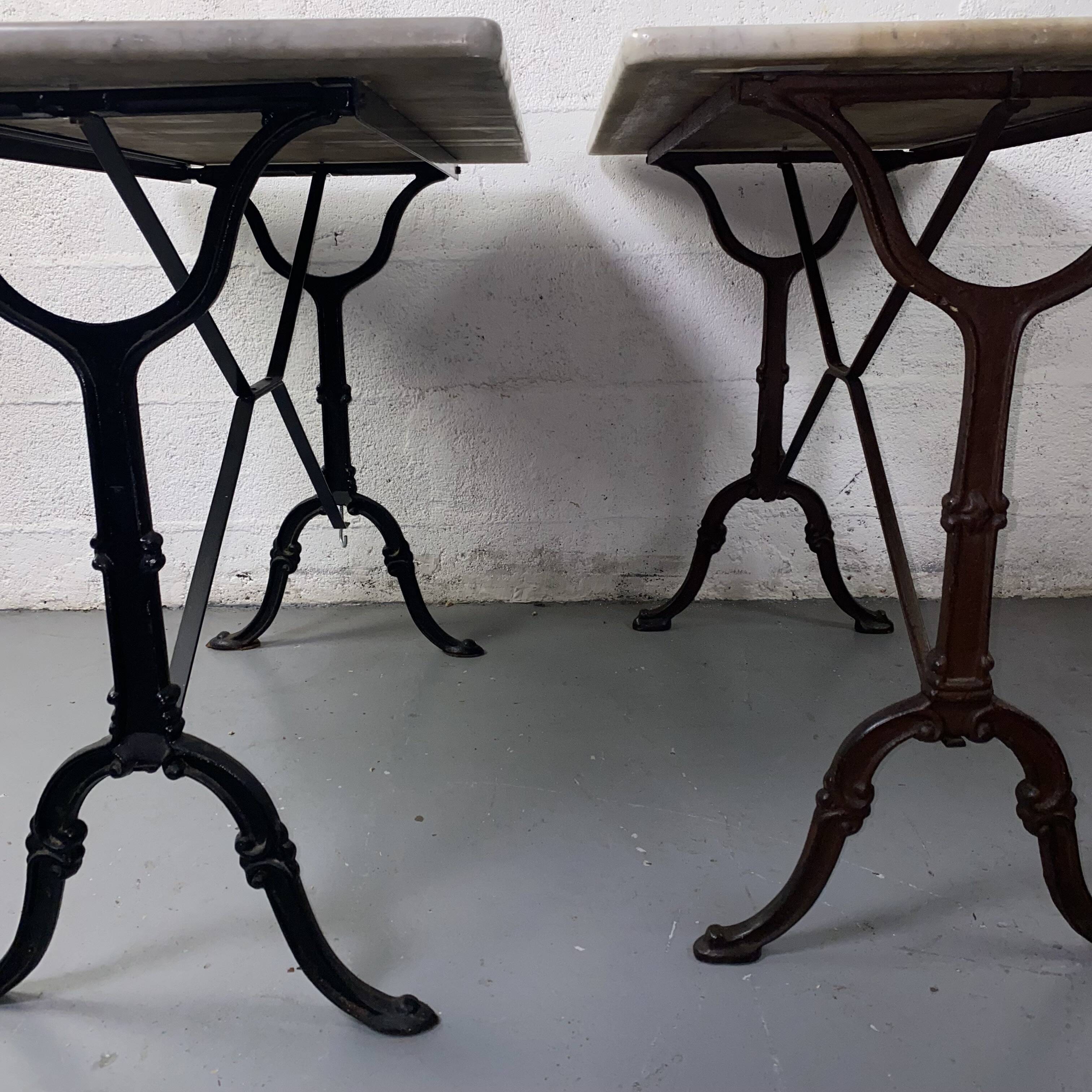 Set of two bistro tables in marble and wrought iron