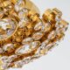 Floral wall light in gilded brass and cut glass by Palwa, Germany, 1970s.