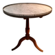 Circular pedestal table with white marble top