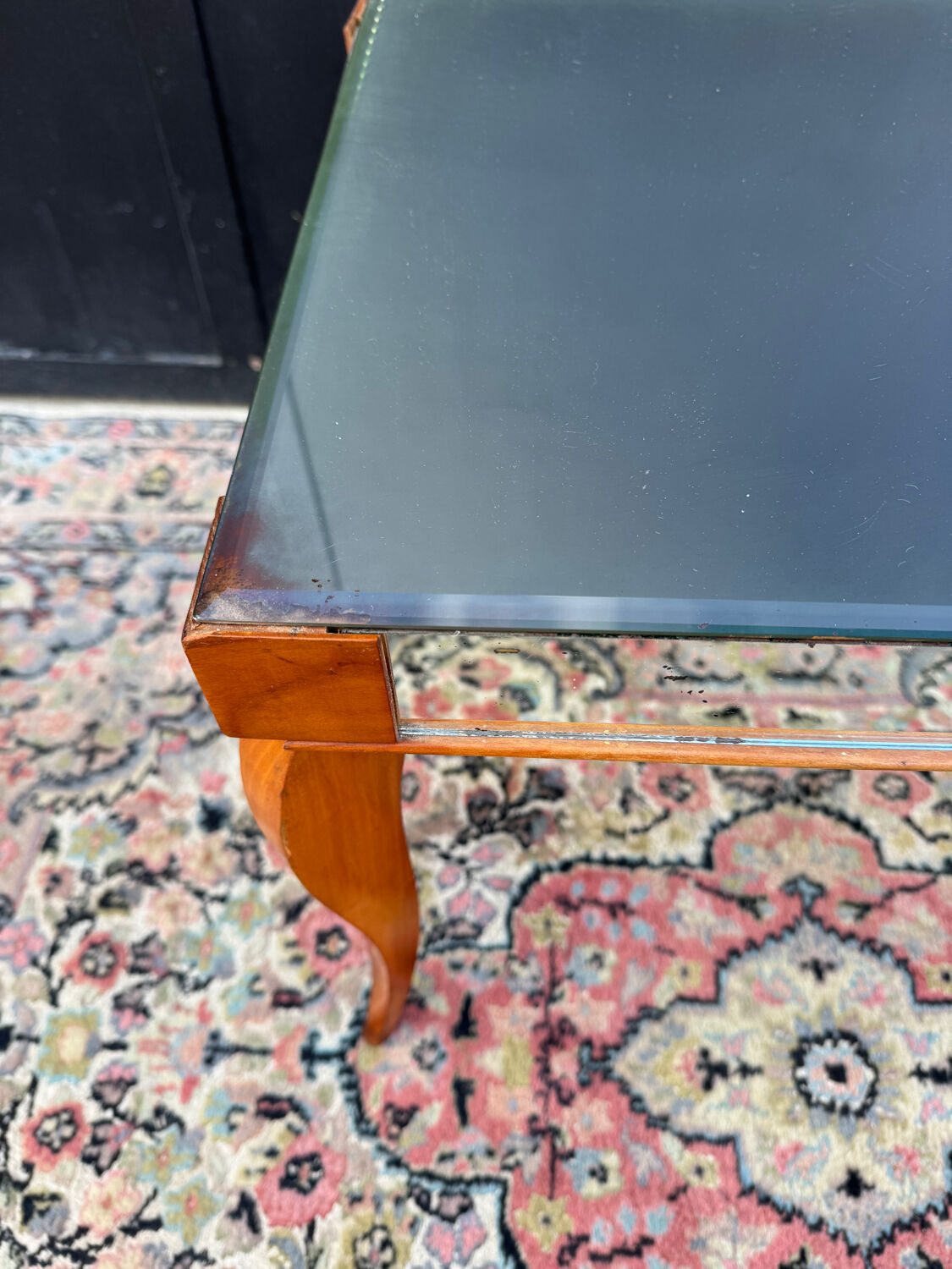 Small wooden coffee table with a mirror from the 1950s.
