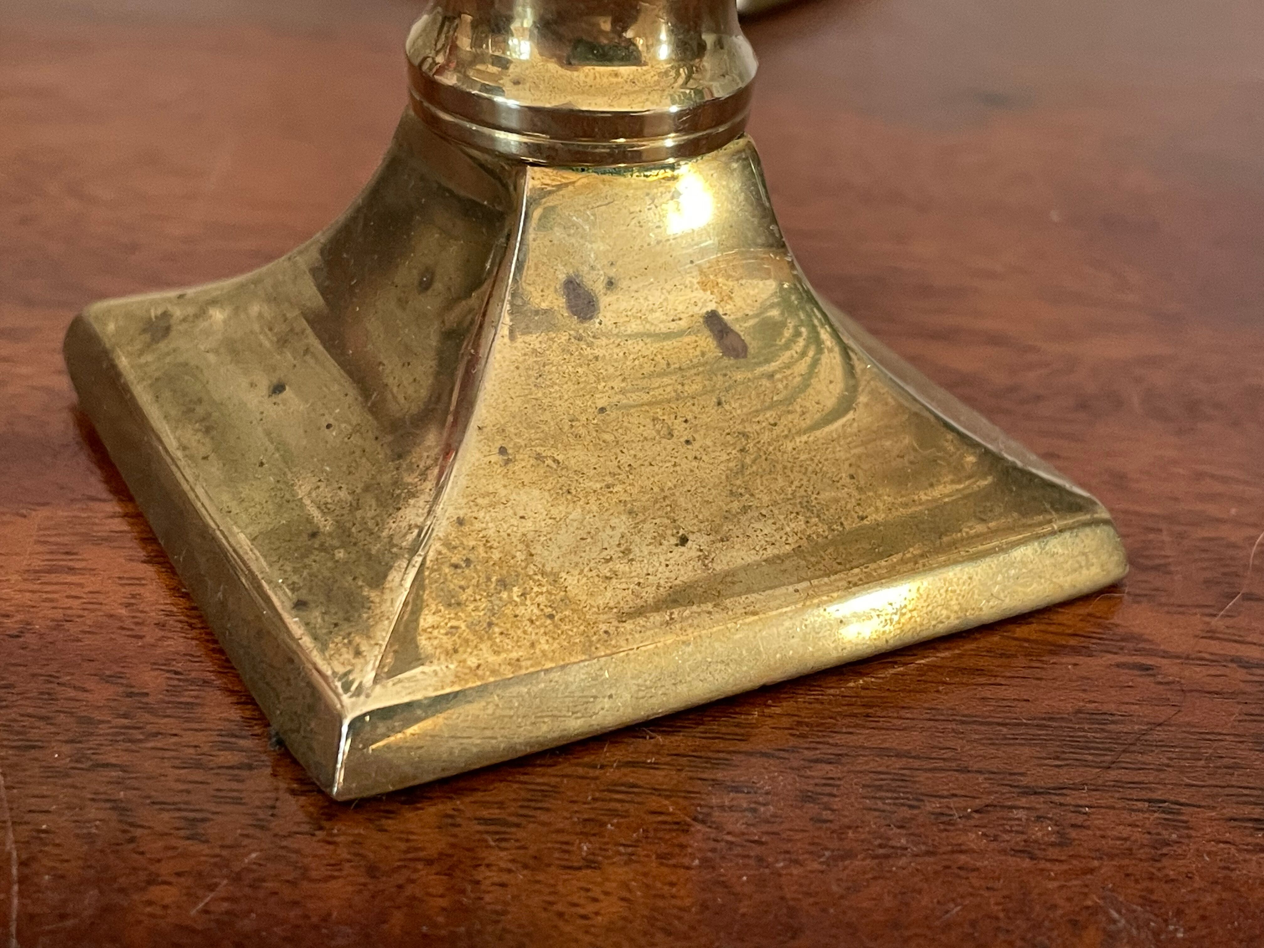Pair of brass column candle holders