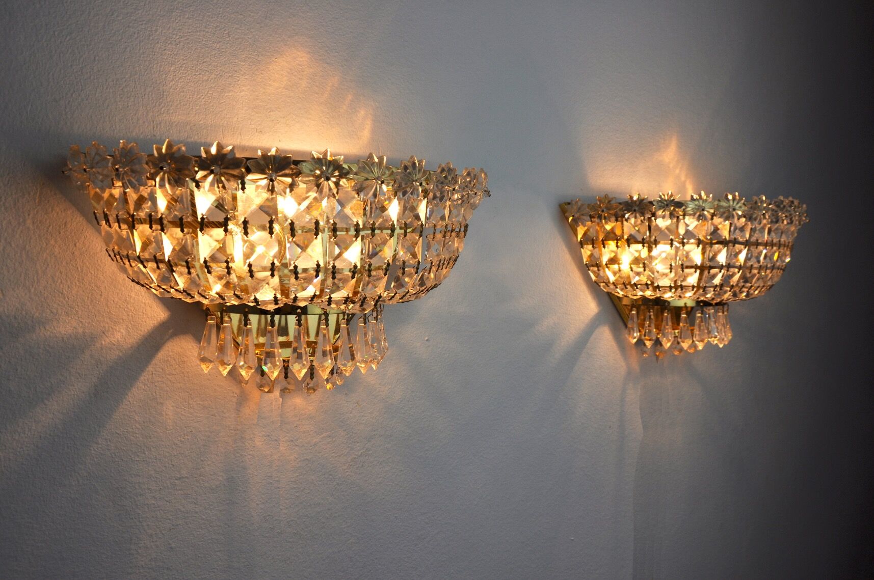 Pair of Regency wall lamps, cut crystals, Italy, 1980