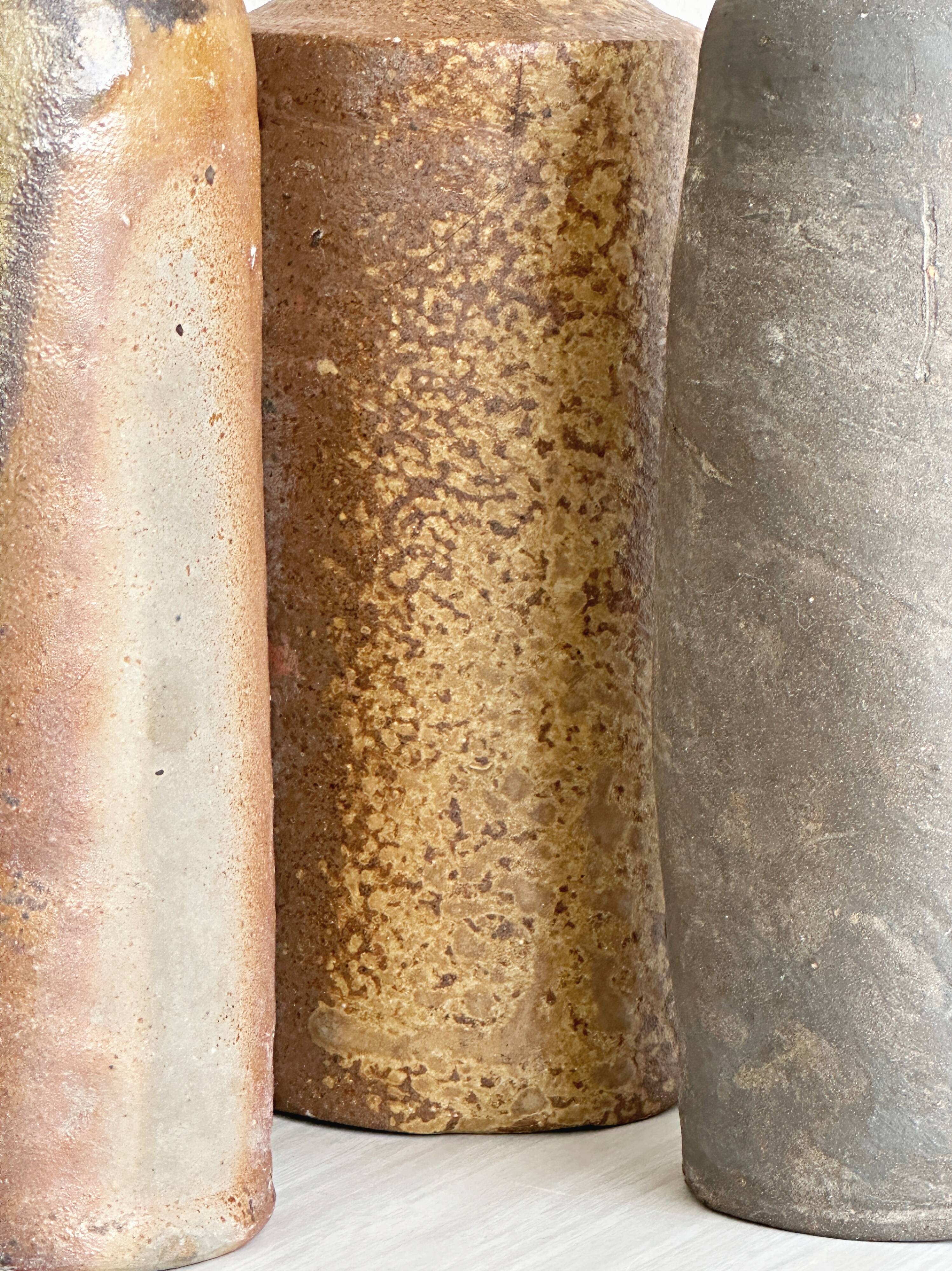 Lot de 3 bouteilles anciennes en grès