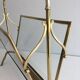 Bamboo-style brass magazine rack from the Baguès house.