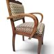 Art Deco armchair with a moustache backrest and curved armrests from the 1930s.