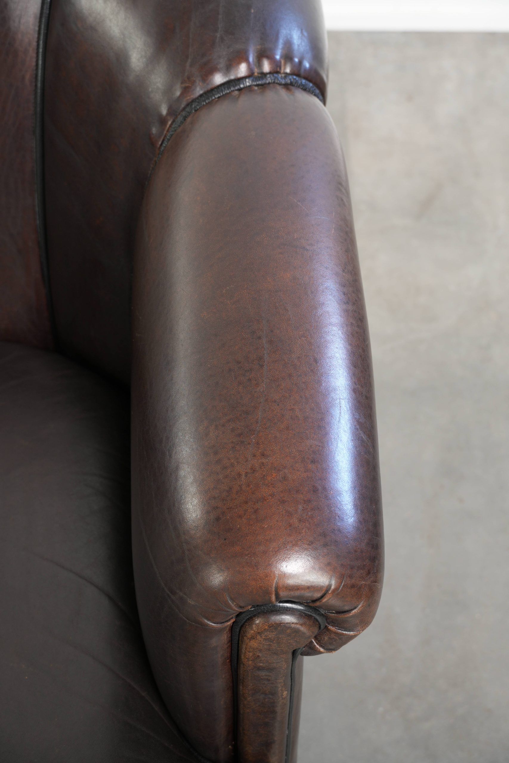 Unique sheepskin 3-seater sofa with deep colours and a distinctive design