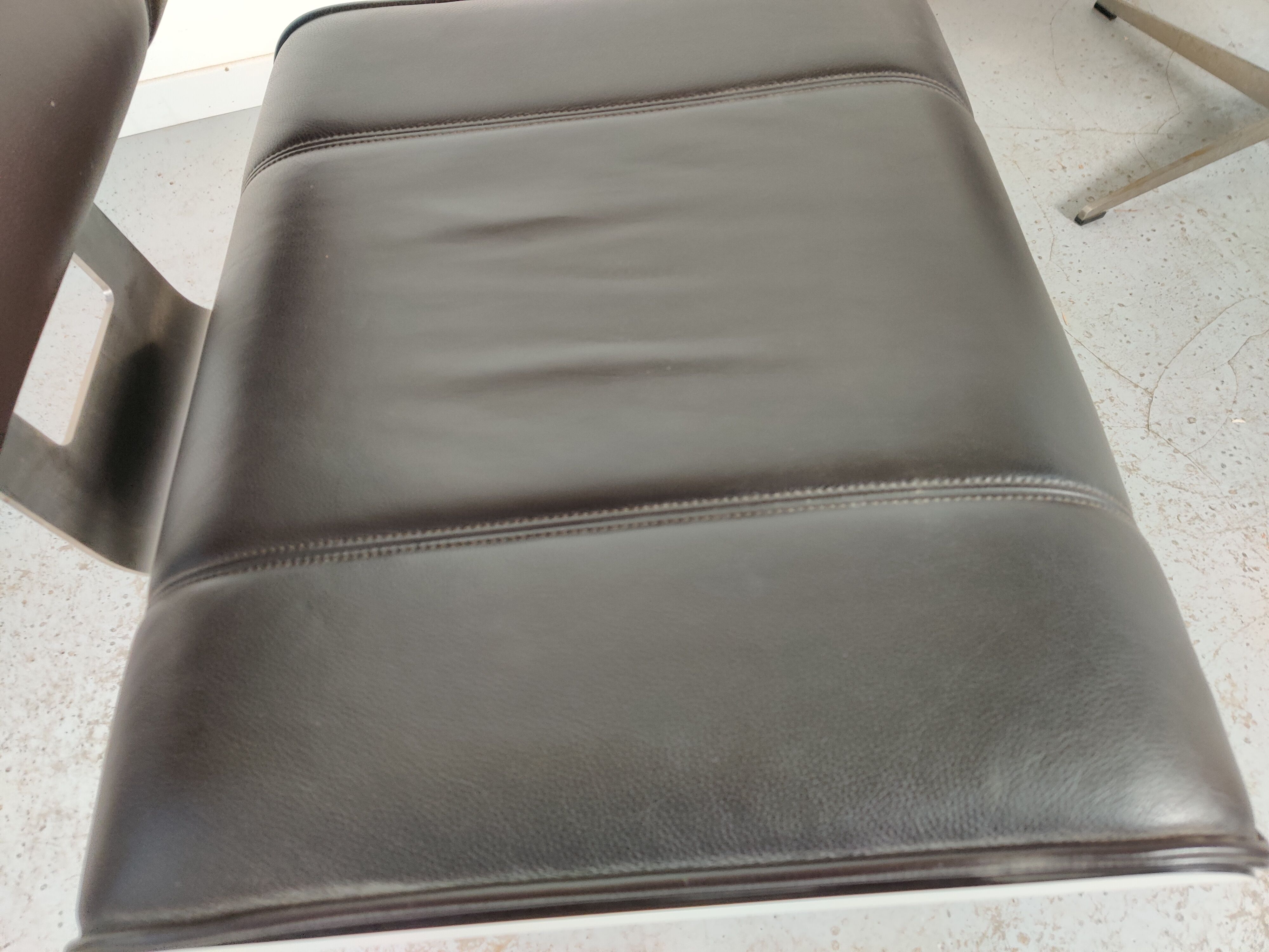 Pair of leather armchairs, 80s/90s