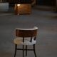 A modern Danish elegant low-back chair, reupholstered in lambswool, 1940s.