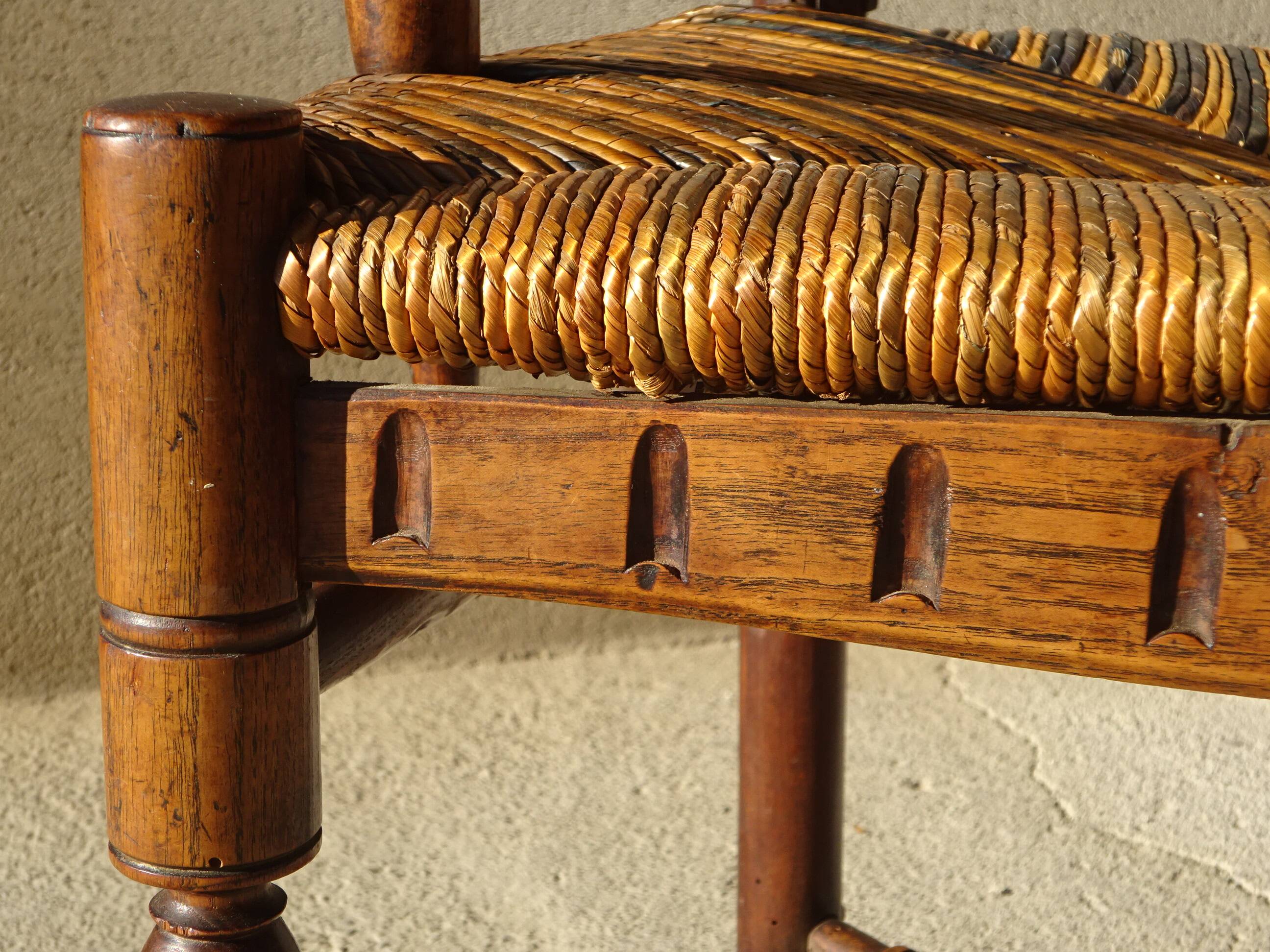 old armchair with leather armrests, from the 19th century
