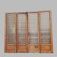 Set of four solid oak partition doors, 20th century