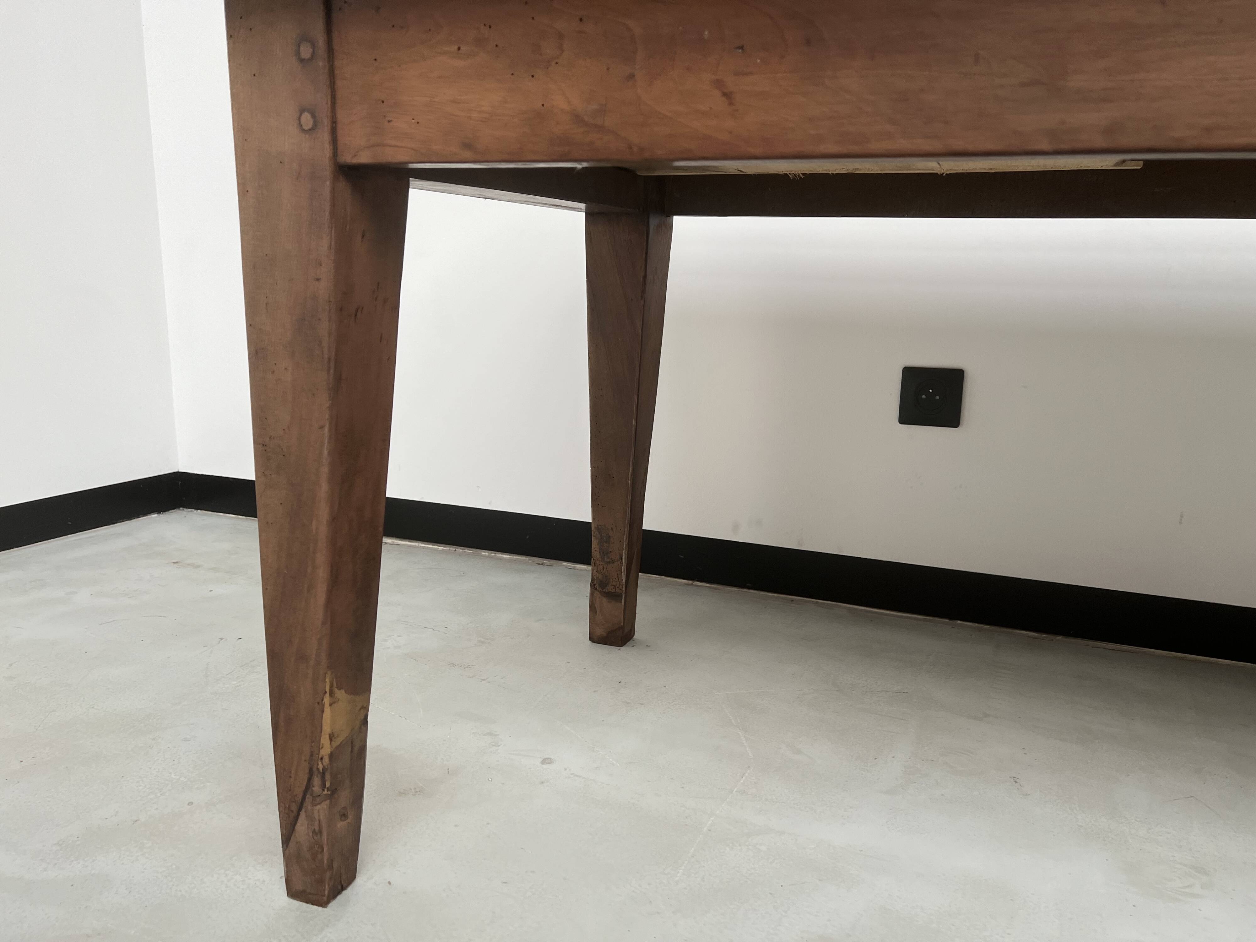 Solid walnut farmhouse table with spindle legs