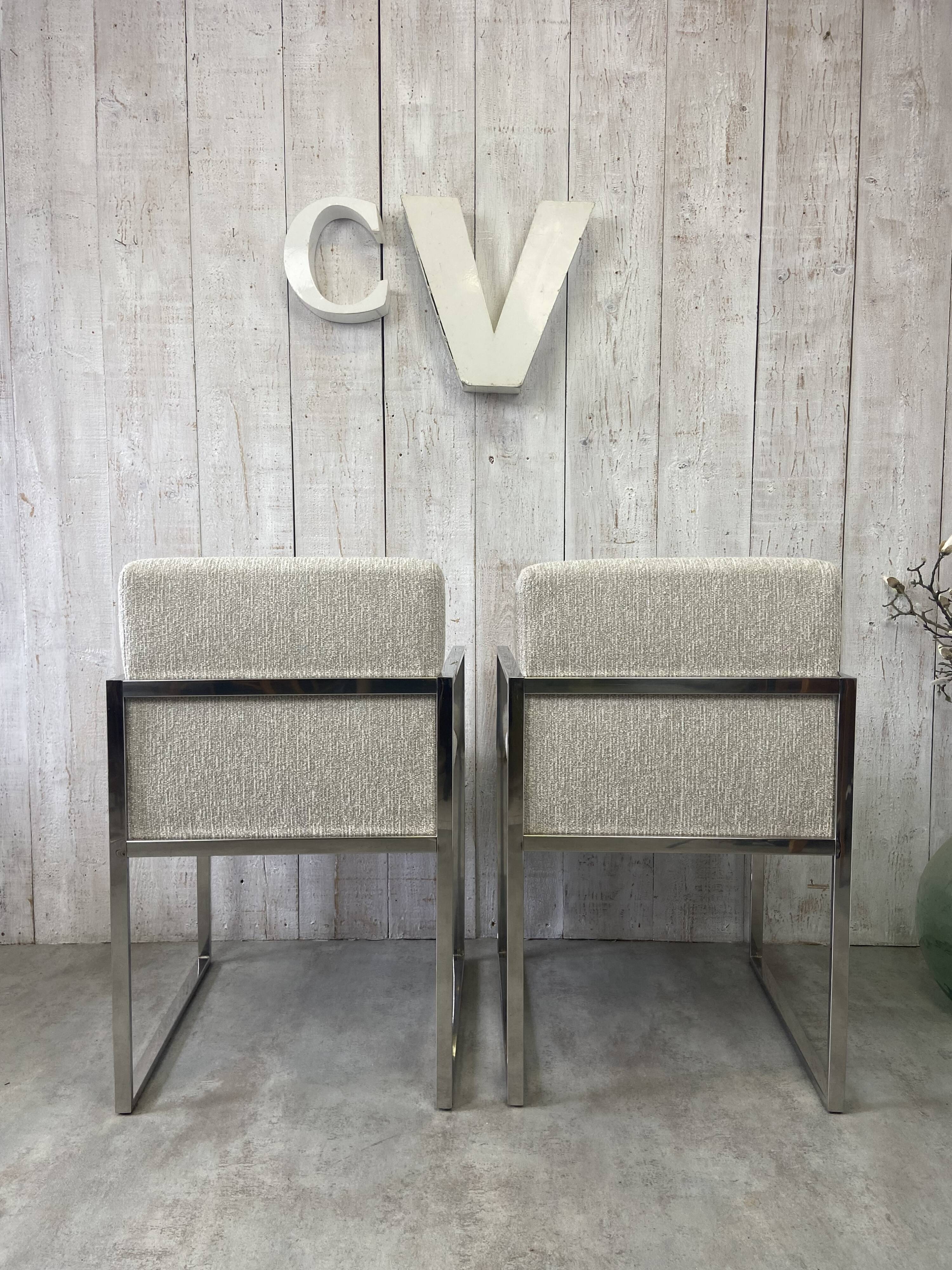 Pair of stainless steel armchairs from the 70s