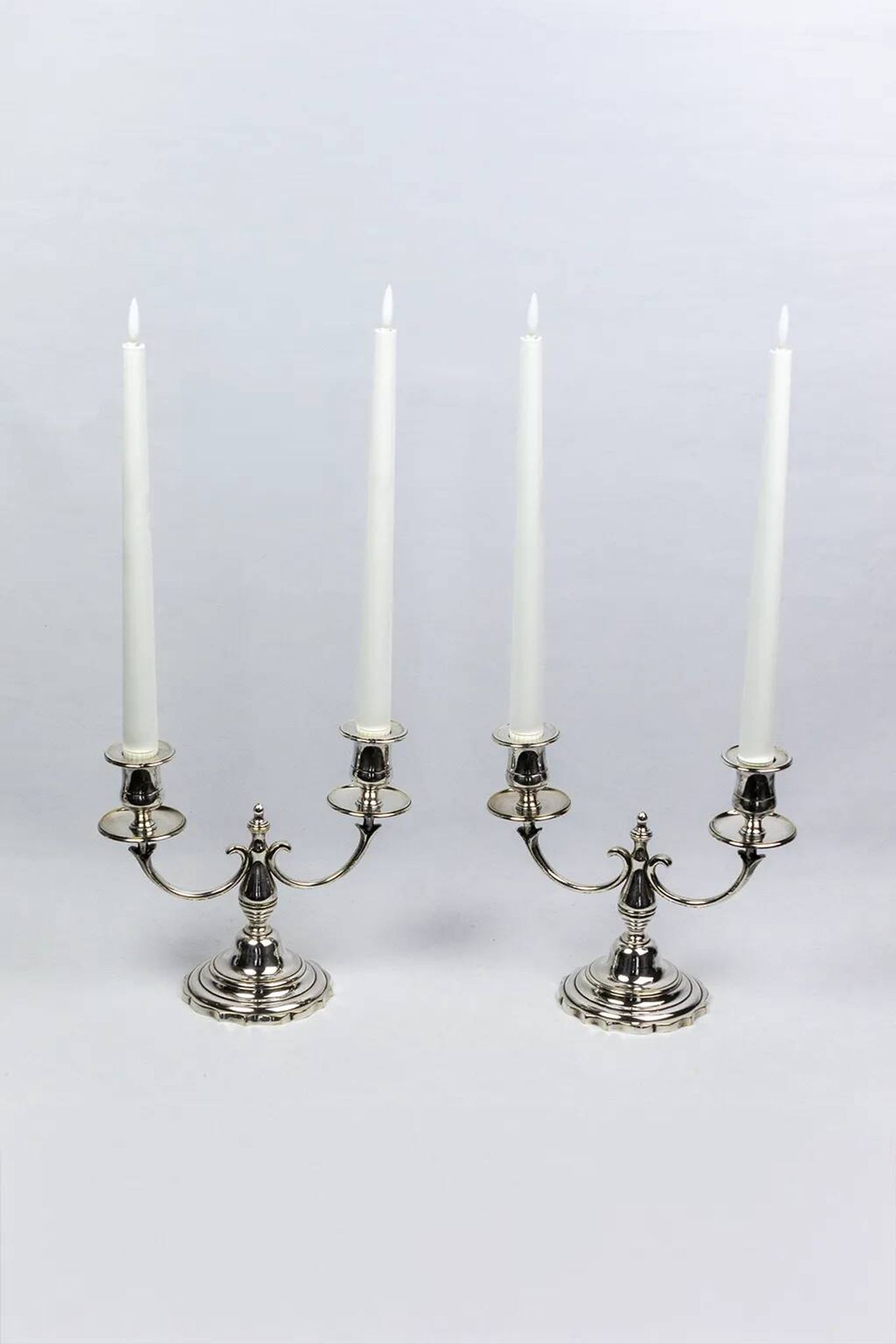 Pair of candlesticks | antique two-armed candelabra in silver-plated metal