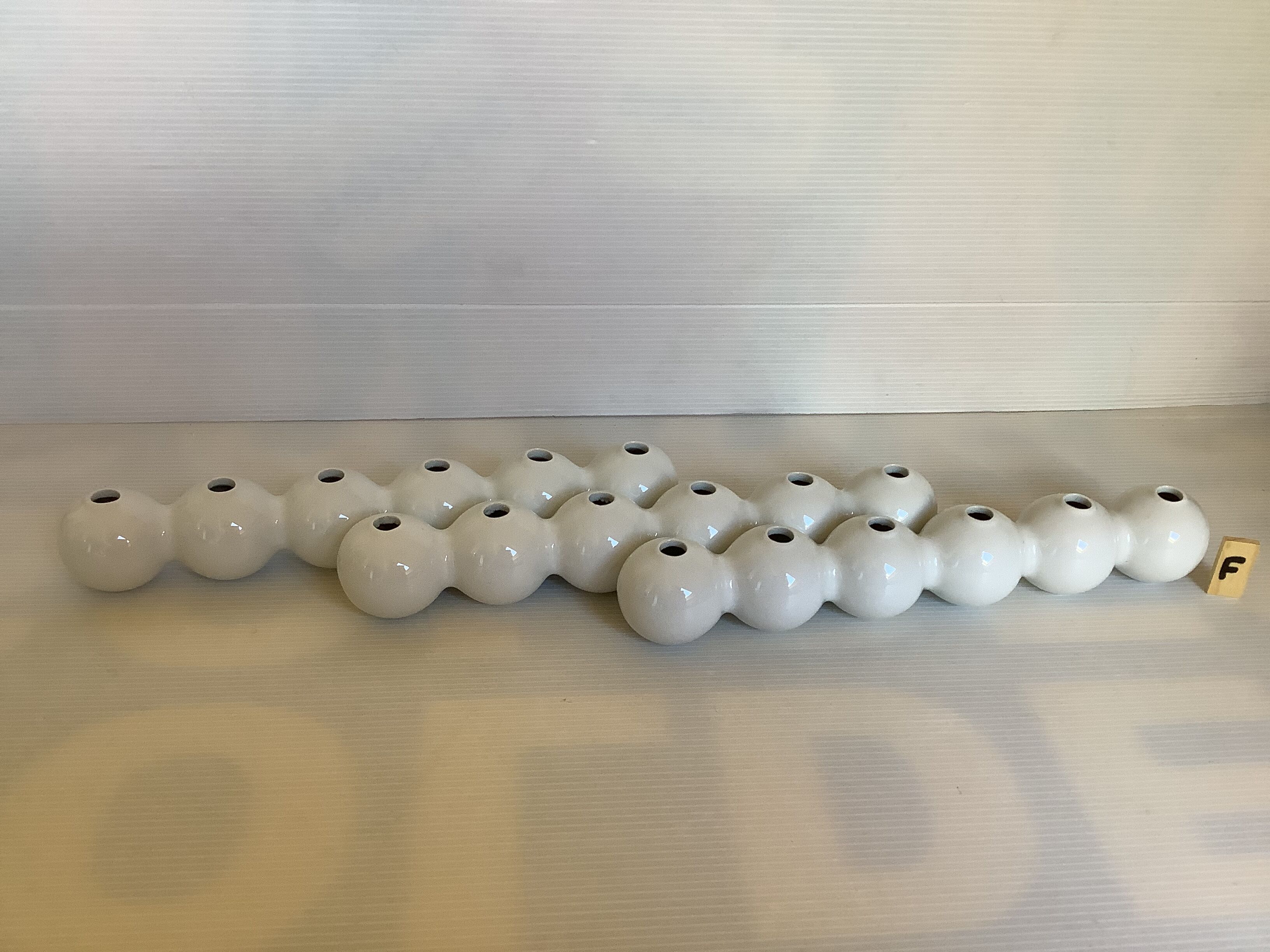 Three flower spikes caterpillar design René Barba Serax