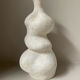 White stoneware vase in an organic shape