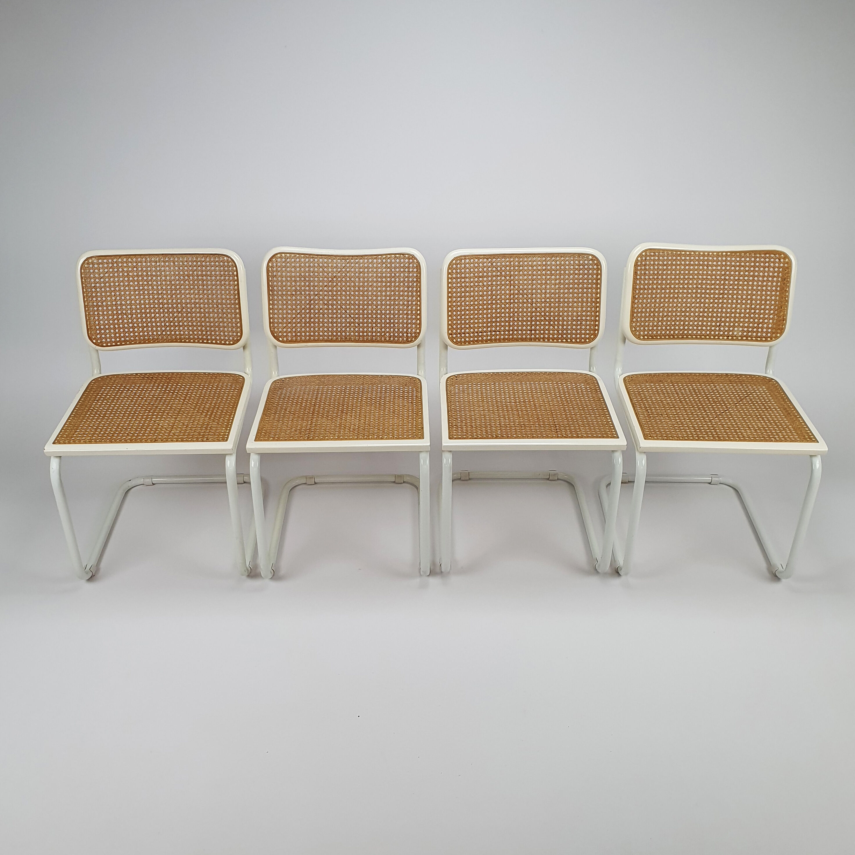 Set of 4 Tubular Frame and Cane Cantilever dining chairs, Italy, 1980s