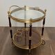 Oval Rolling Table in Brass and Mahogany with Openwork Gallery and Bottle Holder