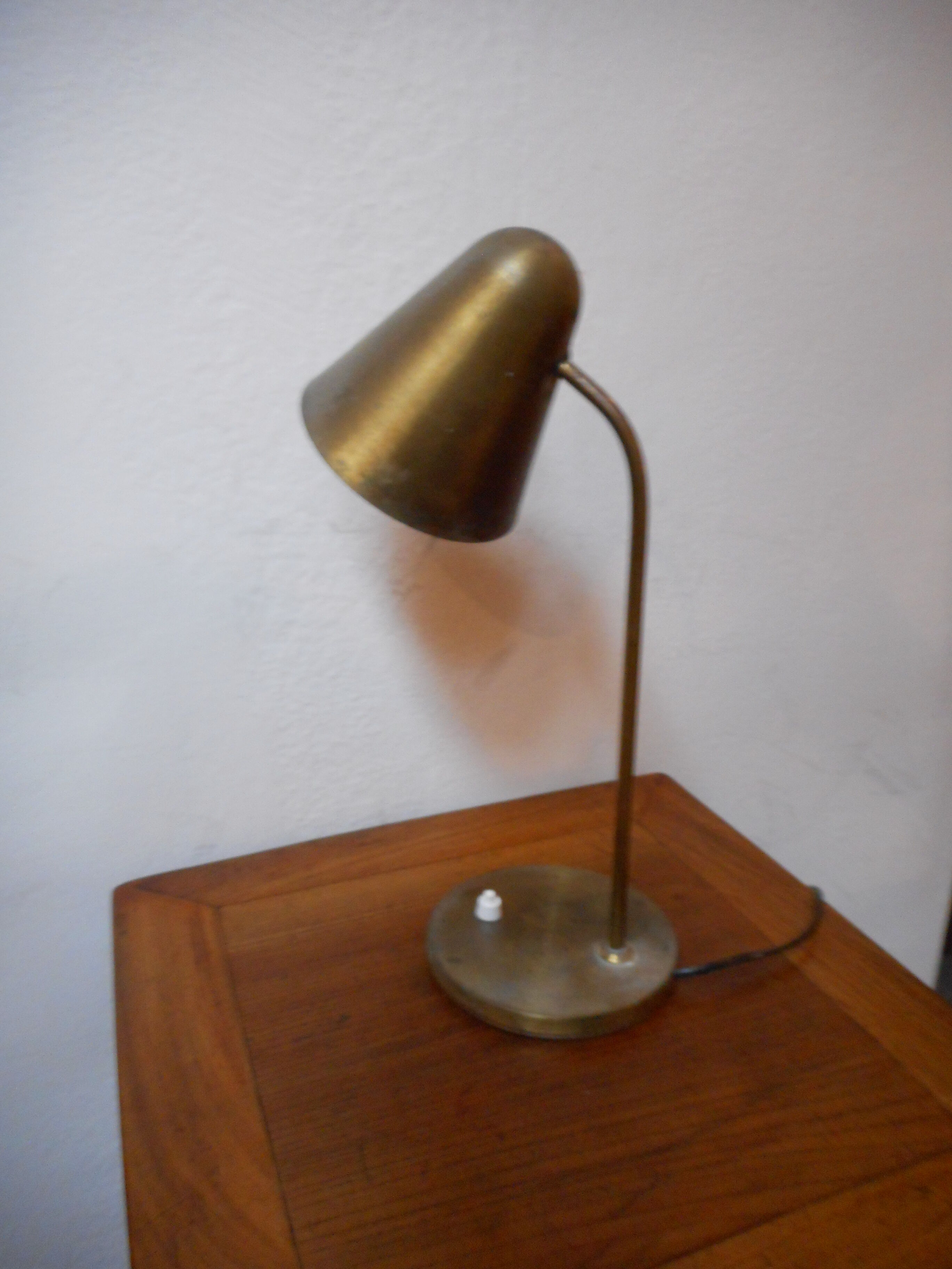 Hinged brass lamp