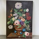 Peinture à l’huile sur bois fleurs signée Grumet