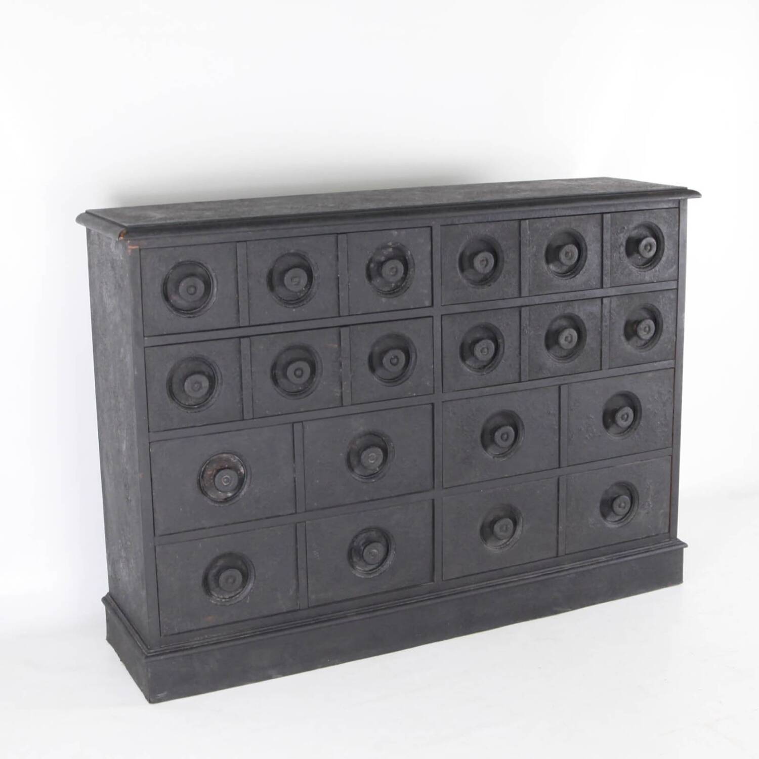 Blackened wooden chest of drawers