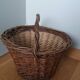 Woven wicker basket with handle