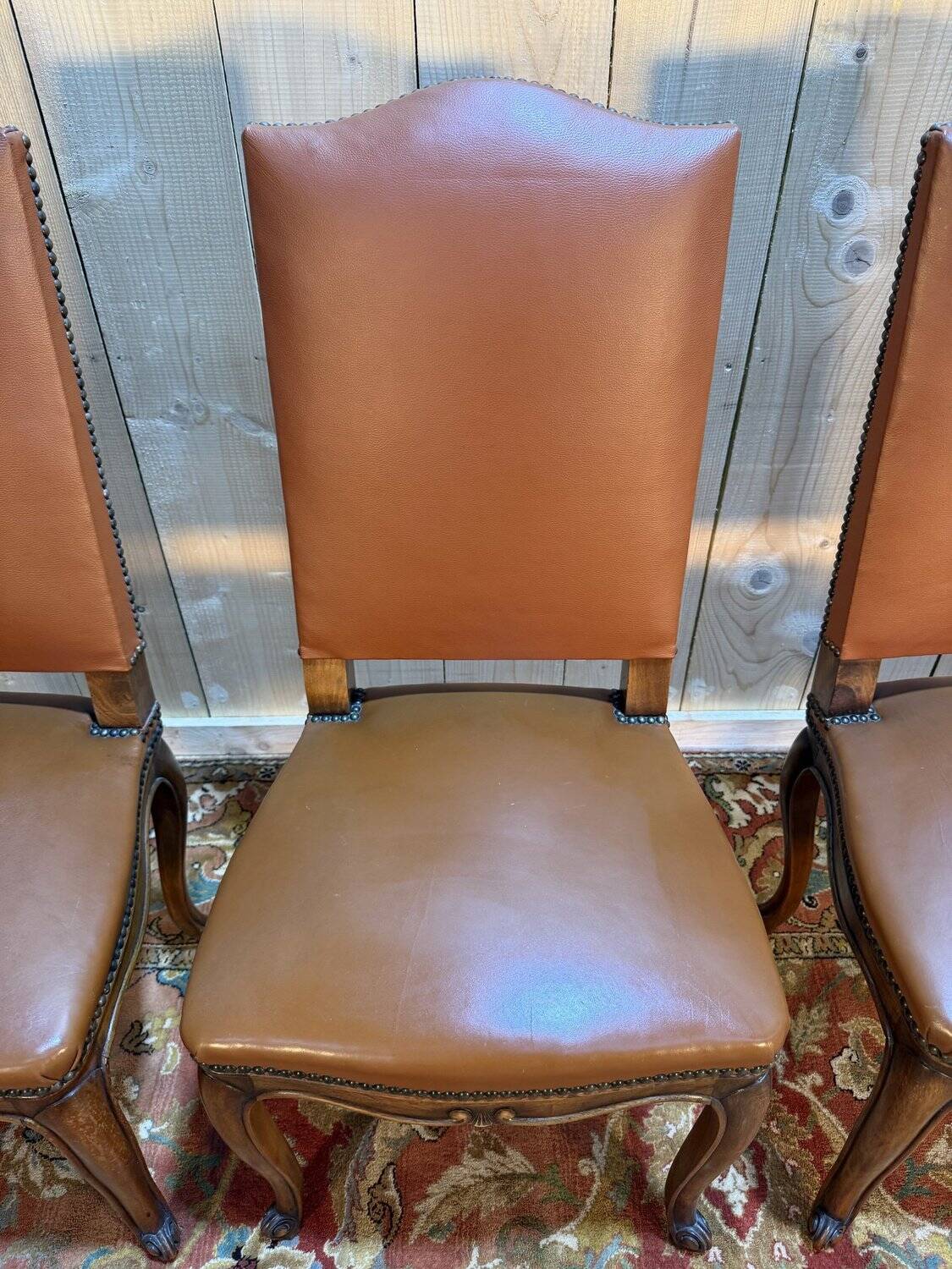 Set of 4 Louis XV style chairs in leather.