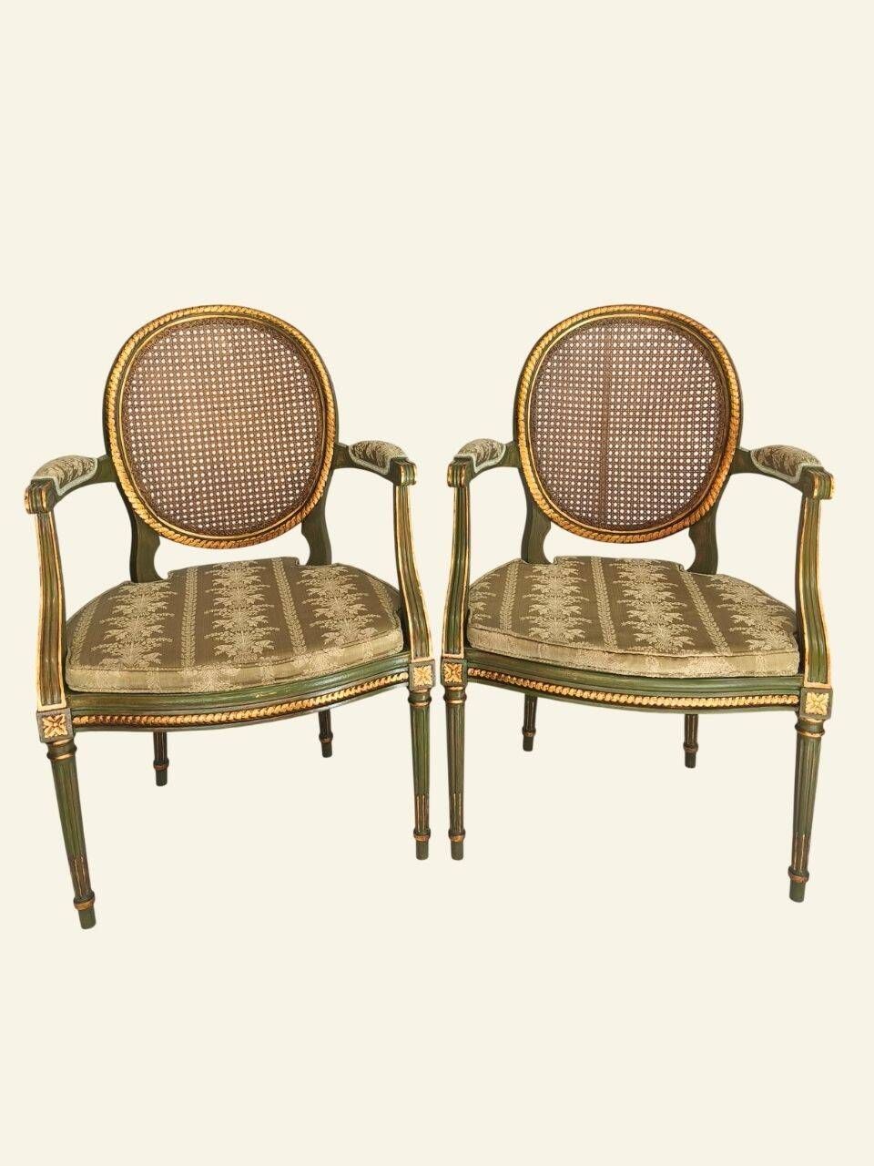 Pair of Louis XVI style armchairs, oval backrest and caning.