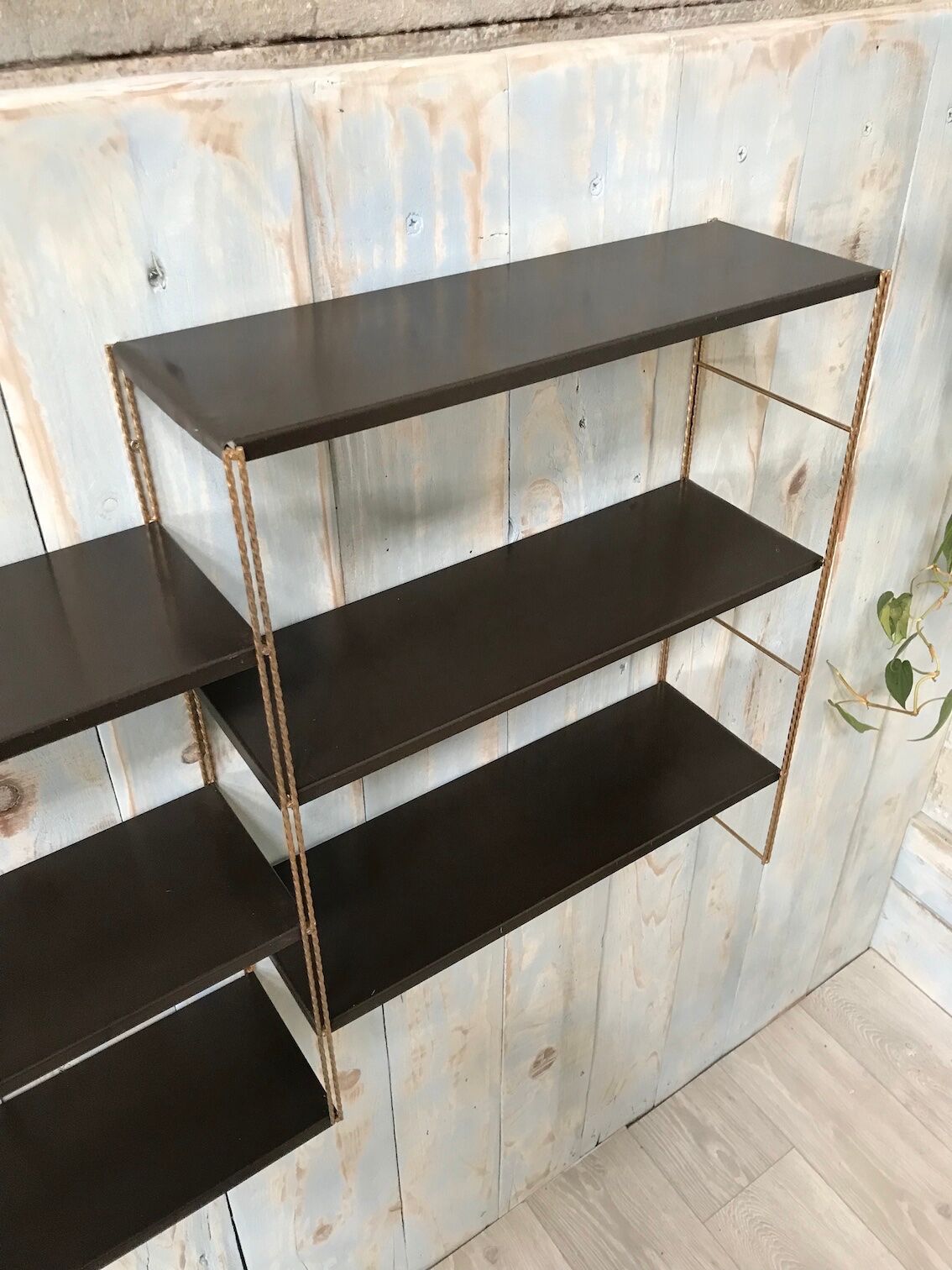 Metal thong shelf