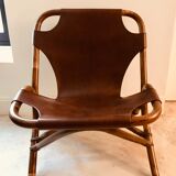 Pair of leather and bamboo armchairs