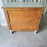 Curved patinated chest of drawers