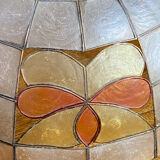 Mother-of-pearl and brass pendant with floral decoration.