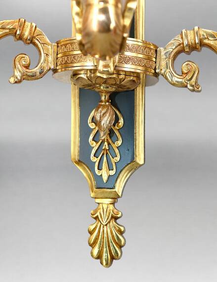 Pair of gold bronze wall lights in Empire style with three lights "Lucien Gau"