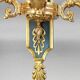Pair of gold bronze wall lights in Empire style with three lights "Lucien Gau"