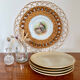 Lot de quatre assiettes plates en grès CNP Village vintage