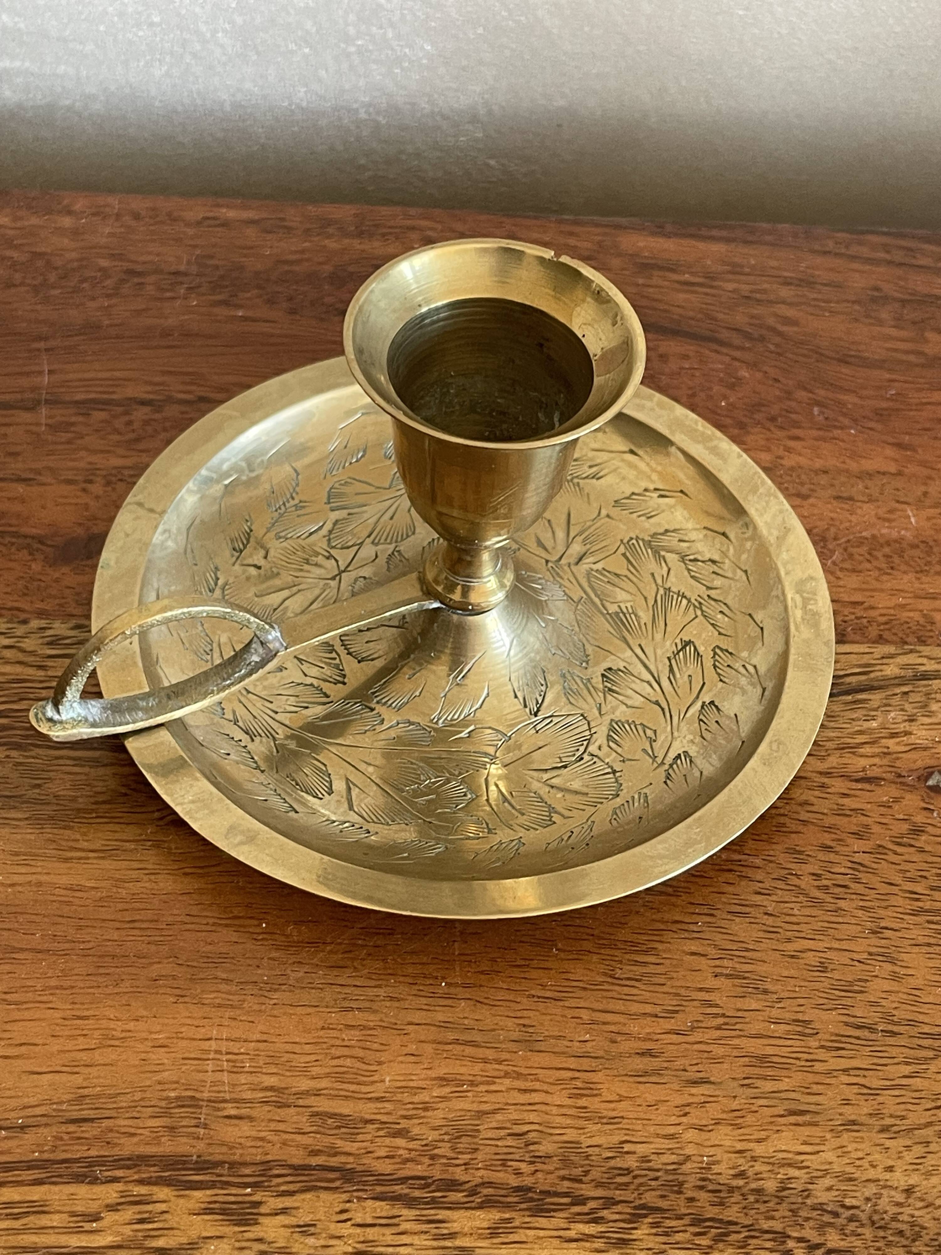 Brass hand candle holder