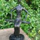 Sculpture of a dancer on a swing signed by Raphaël
