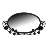 Art Deco wrought iron mirror with rose decoration, France, circa 1920.