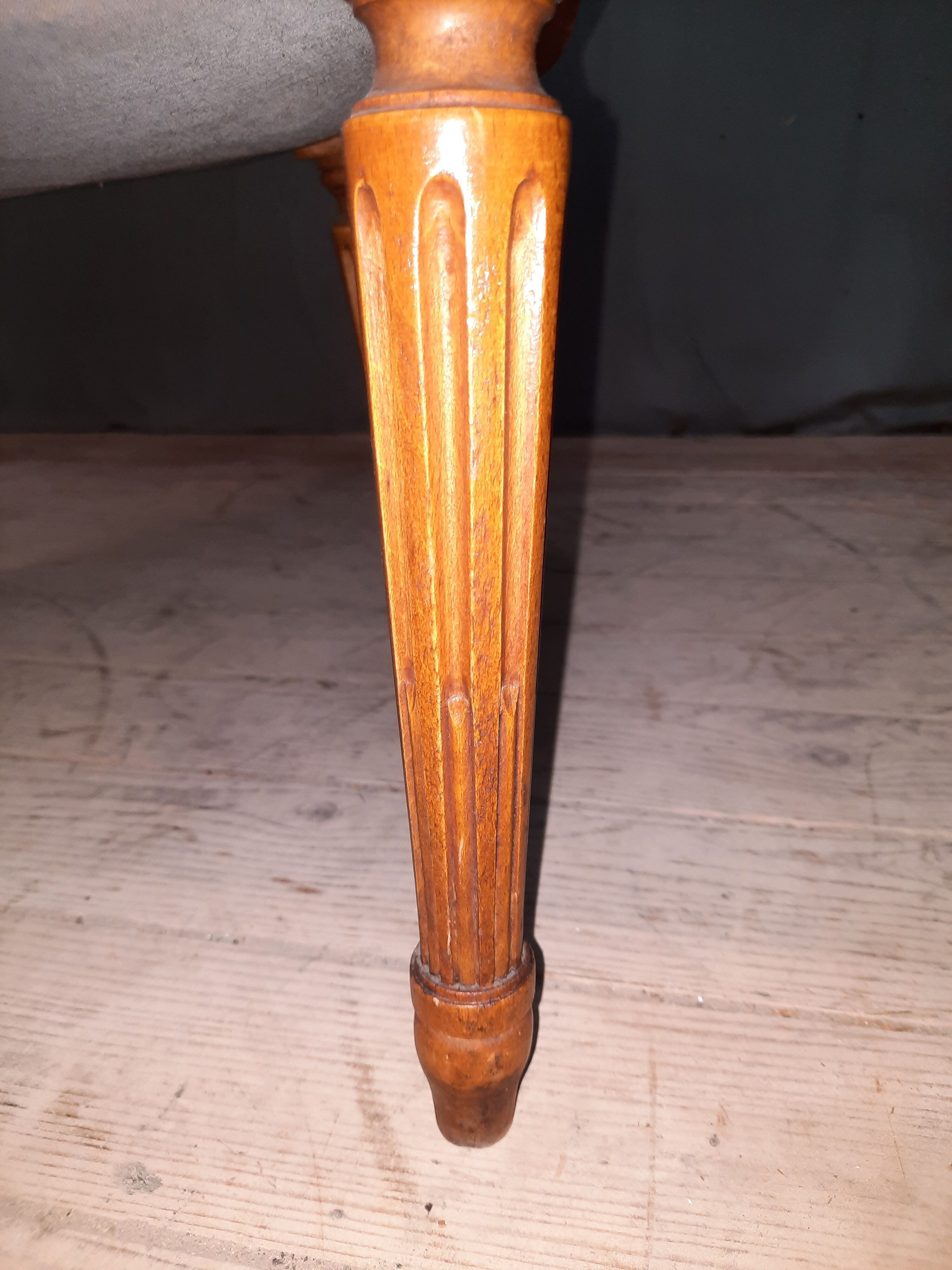 Pair of Louis XVI style leather armchairs