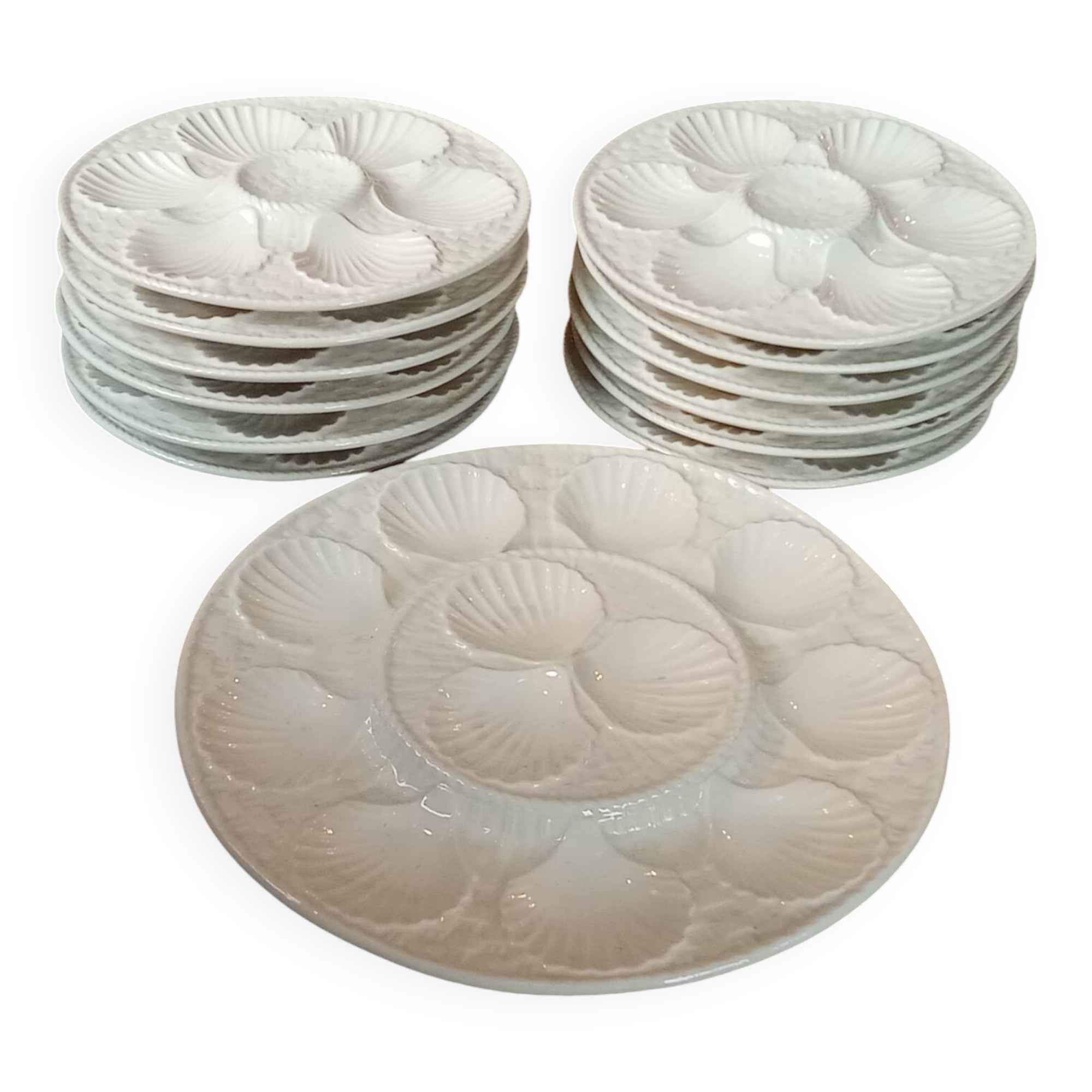 Service 12 plates. + Oyster barbotine shellfish dish