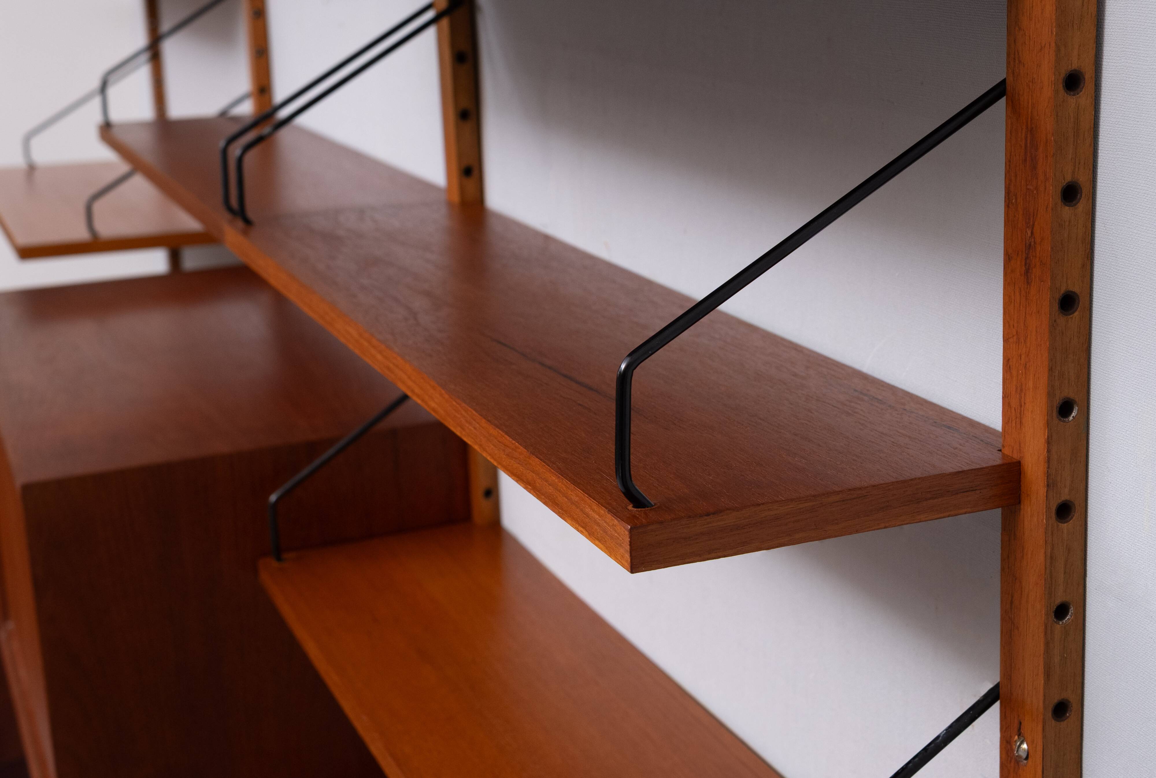 Poul Cadovius hanging Royal Wall System 1950s Denmark