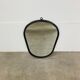 Oval mirror from the 1950s, wrought iron and brass.