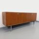 Vintage modernist enfilade in rosewood and chrome metal from the 60s and 70s.