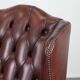 Fauteuil à oreilles Chesterfield en cuir classique et élégant de style anglais